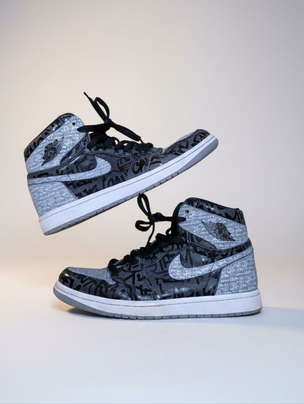 Nike Air Jordan 1 Retro High OG "Rebellionaire" Sneaker